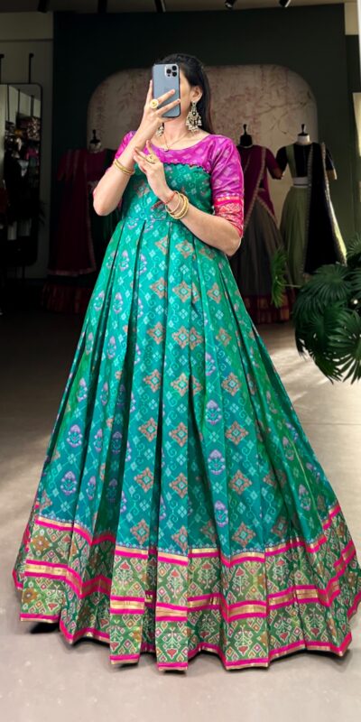 Firozi Jacquard Patola Gown | Gowns, Bollywood Gowns, Creative Gowns, Designer Gowns, Embroidered Gowns, Party Wear Gowns