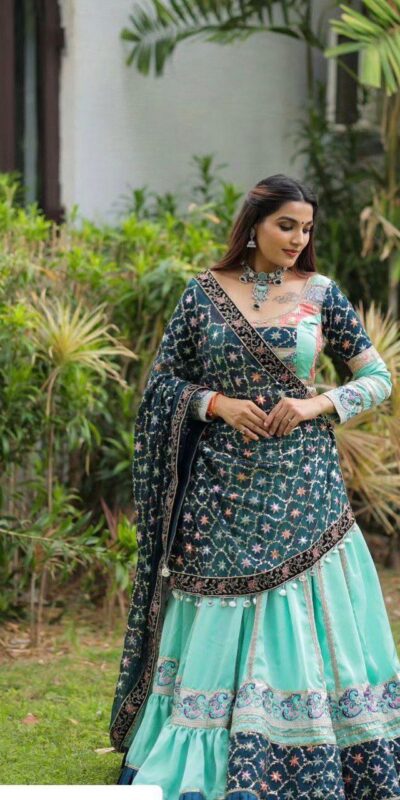 Firozi Silk Cowrie Work Embroidery Lehenga Choli | Lehenga, Bollywood Lehenga, Creative Lehenga, Designer Lehenga, Embroidered Lehenga, Party Wear Lehenga