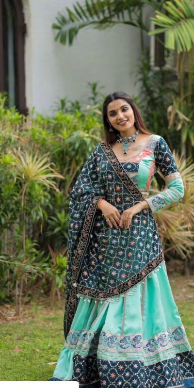 Firozi Silk Cowrie Work Embroidery Lehenga Choli | Lehenga, Bollywood Lehenga, Creative Lehenga, Designer Lehenga, Embroidered Lehenga, Party Wear Lehenga