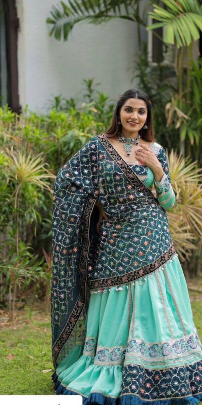 Firozi Silk Cowrie Work Embroidery Lehenga Choli | Lehenga, Bollywood Lehenga, Creative Lehenga, Designer Lehenga, Embroidered Lehenga, Party Wear Lehenga