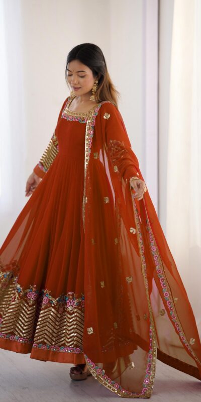 Rust Georgette Multi Thread Work Gown | Jump Suits, Salwar suit, Casual Suits, Creative suits, Designer Suits, Palazzo Suits, Party Wear Suits, Patiala Suits, Straight Suits