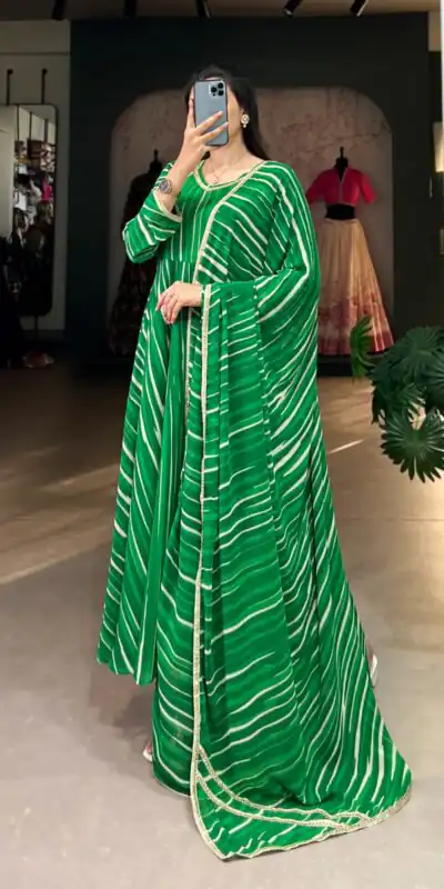Green Georgette Leheriya Gown | Gowns, Bollywood Gowns, Creative Gowns, Designer Gowns, Embroidered Gowns, Party Wear Gowns