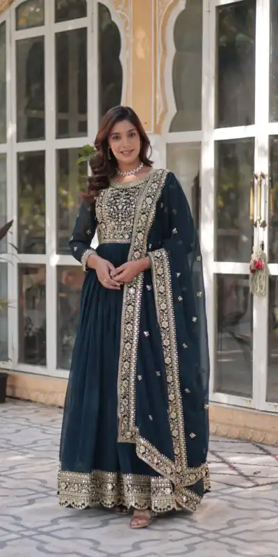 Teal Faux Blooming With Embroidery Zari Work Gown | Gowns, Bollywood Gowns, Creative Gowns, Designer Gowns, Embroidered Gowns, Party Wear Gowns