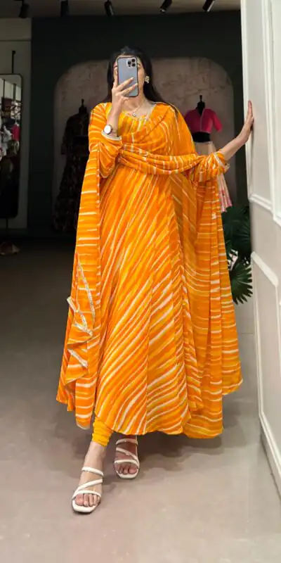 Yellow Georgette Leheriya Gown | Gowns, Bollywood Gowns, Creative Gowns, Designer Gowns, Embroidered Gowns, Party Wear Gowns