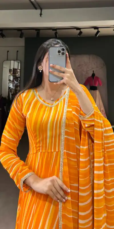 Yellow Georgette Leheriya Gown | Gowns, Bollywood Gowns, Creative Gowns, Designer Gowns, Embroidered Gowns, Party Wear Gowns