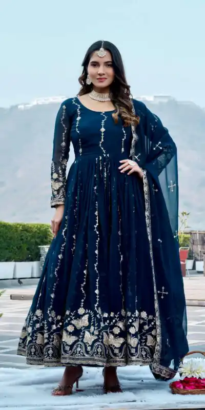 Ram 167 Teal Faux Georgette Gown with Mirror Work & Embroidery Work. Get it for ₹2349. Delivery 4-6 Working Days. Online Shop now. | Gowns, Bollywood Gowns, Creative Gowns, Designer Gowns, Embroidered Gowns, Party Wear Gowns