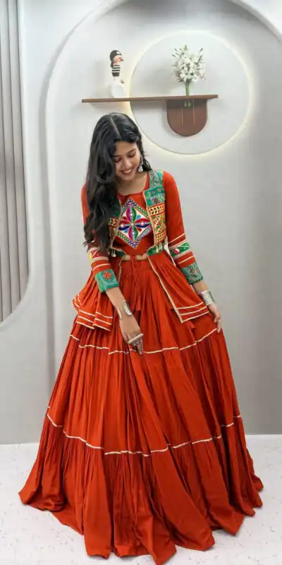 Ram 120 Orange in Pure Cotton Mirror Work & Gamthi Work Lehenga Choli . Exclusive Offer ₹3049. Delivery 4-6 Working Days. Shop now. | Lehenga, Bollywood Lehenga, Creative Lehenga, Designer Lehenga, Embroidered Lehenga, Party Wear Lehenga