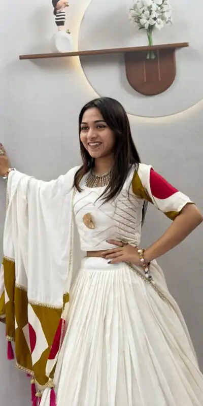 Ram 194 White in Pure Cotton Mirror Work & Gamthi Work Lehenga Choli . Exclusive Offer ₹3149. Delivery 4-6 Working Days. Shop now. | Lehenga, Bollywood Lehenga, Creative Lehenga, Designer Lehenga, Embroidered Lehenga, Party Wear Lehenga